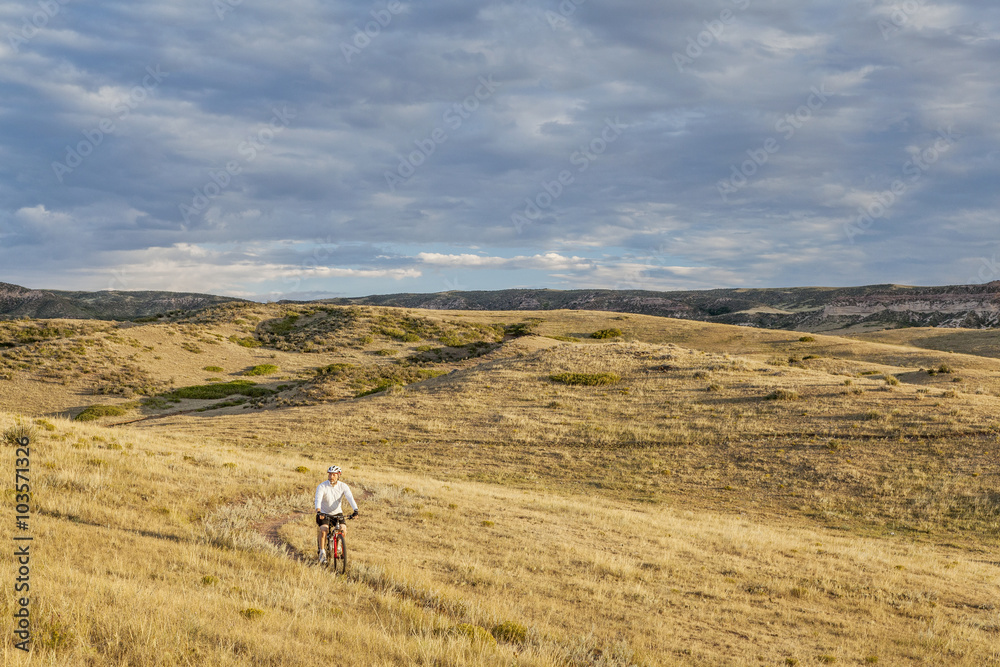 moutain biking in a rolling prairie