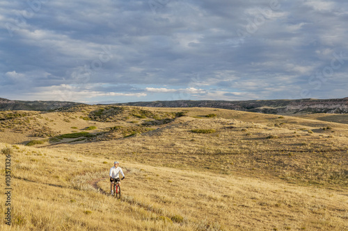 moutain biking in a rolling prairie