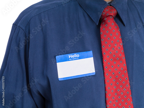 Photo of senior man in a blue shirt and red tie wearing a 