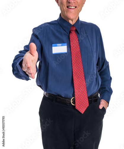 Photo of senior man in a blue shirt and red tie wearing a 