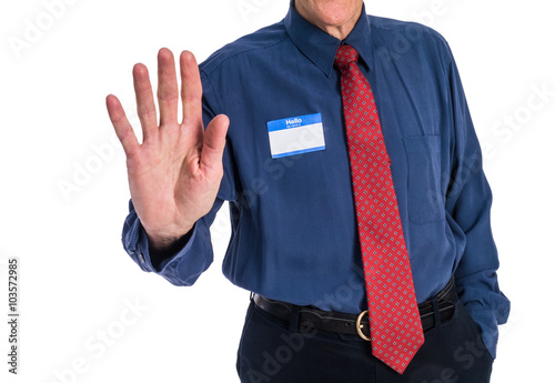 Photo of senior man in a blue shirt and red tie wearing a 