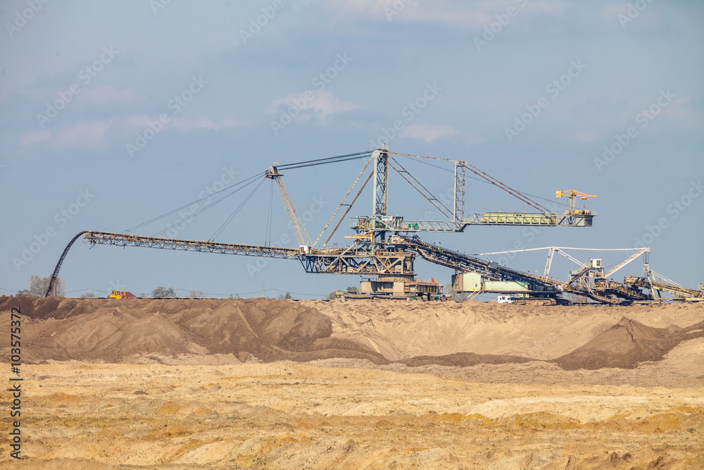 Opencast brown coal mine. Giant excavator.