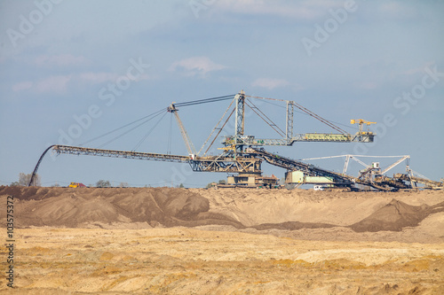 Opencast brown coal mine. Giant excavator.