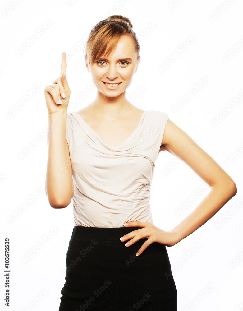 business woman pointing at white background. business woman pointing at white background.