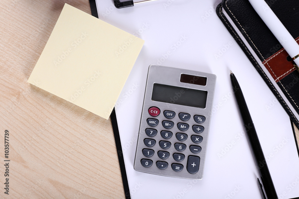 Office supply on wooden background Office supply on wooden background