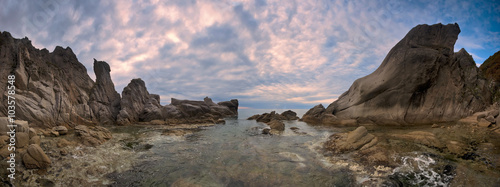 Panorama of rocky coastline of the East Sea overcast day.
