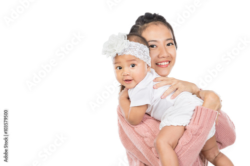 Woman holding her baby girl