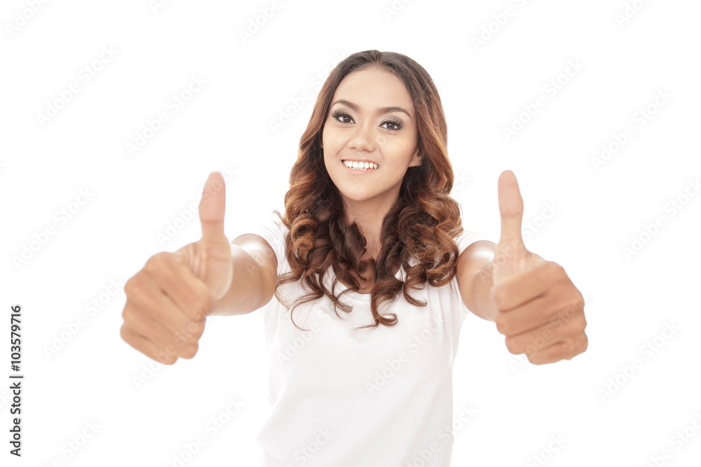 attractive young woman giving two thumbs up attractive young woman giving two thumbs up