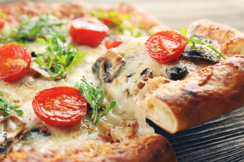 Piece of freshly homemade pizza closeup