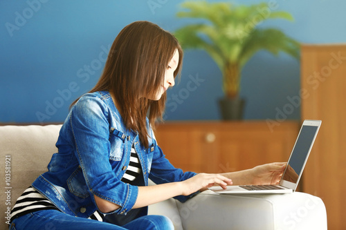 Beautiful girl with laptop ...