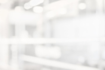 abstract white and gray bokeh lights background with motion blur