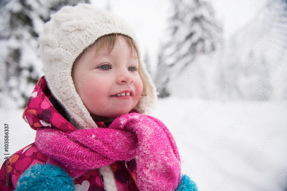 little girl have fun at snowy winter day little girl have fun at snowy winter day
