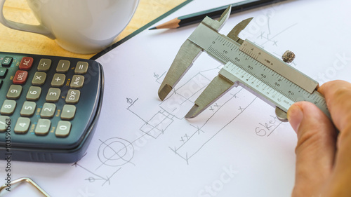measurement dimension drawing in paper by vernier calipers