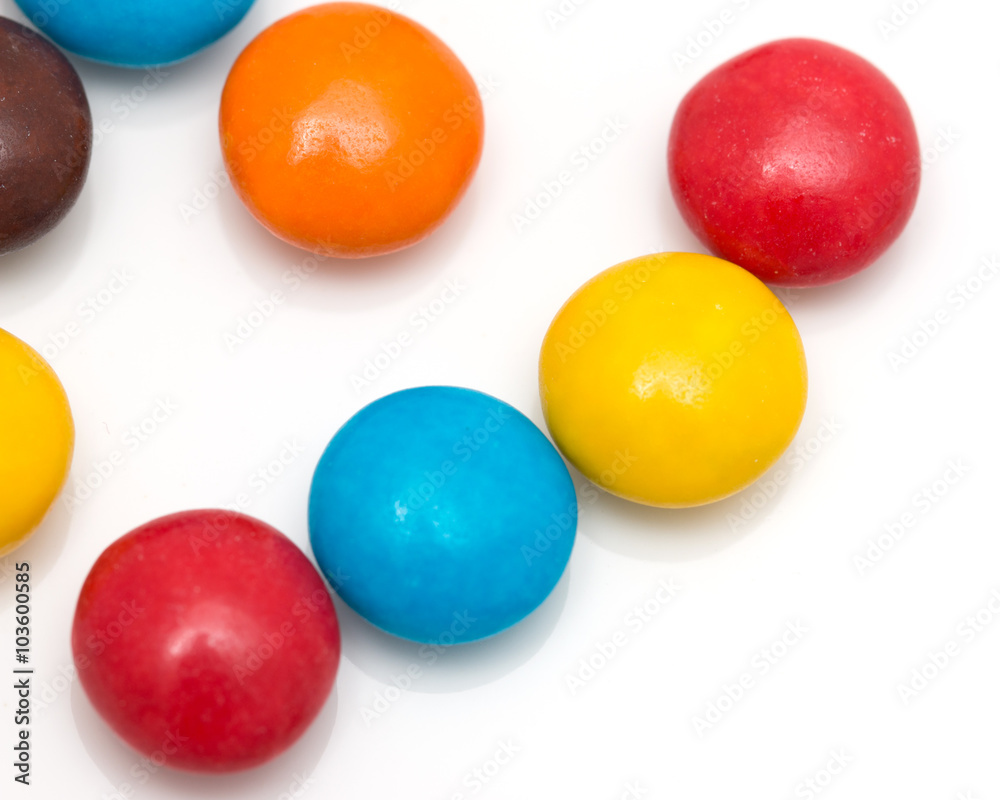 colorful round candy on a white background colorful round candy on a white background