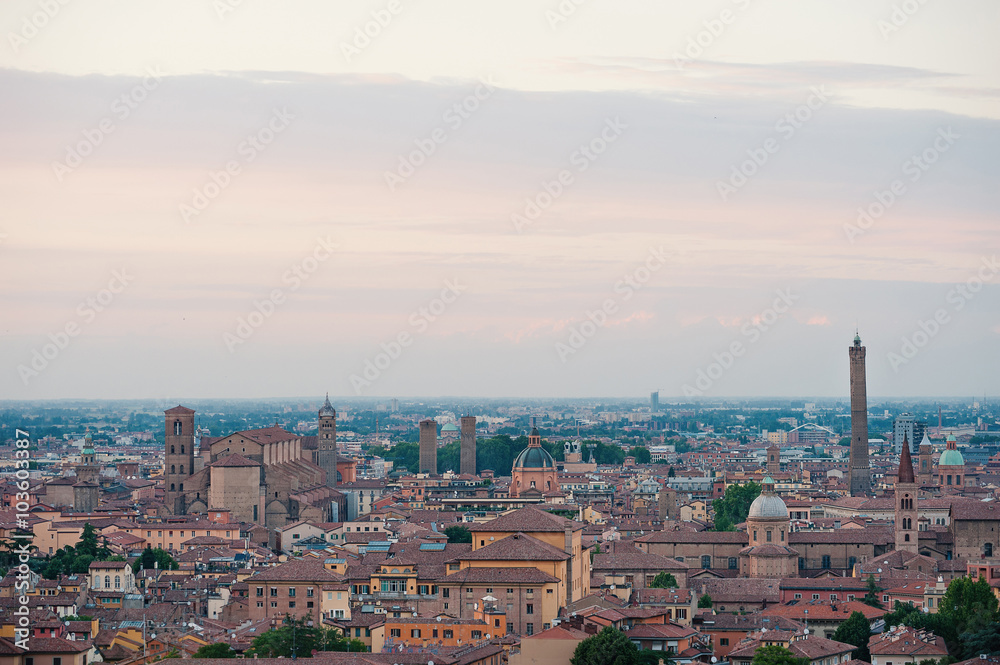 Panoramic view of the roofs of Bologna, Italy, at sunset.