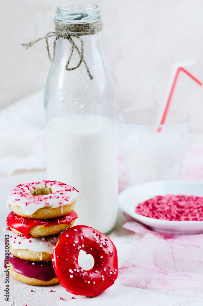 Breakfast with homemade colorful donuts and milk Breakfast with homemade colorful donuts and milk