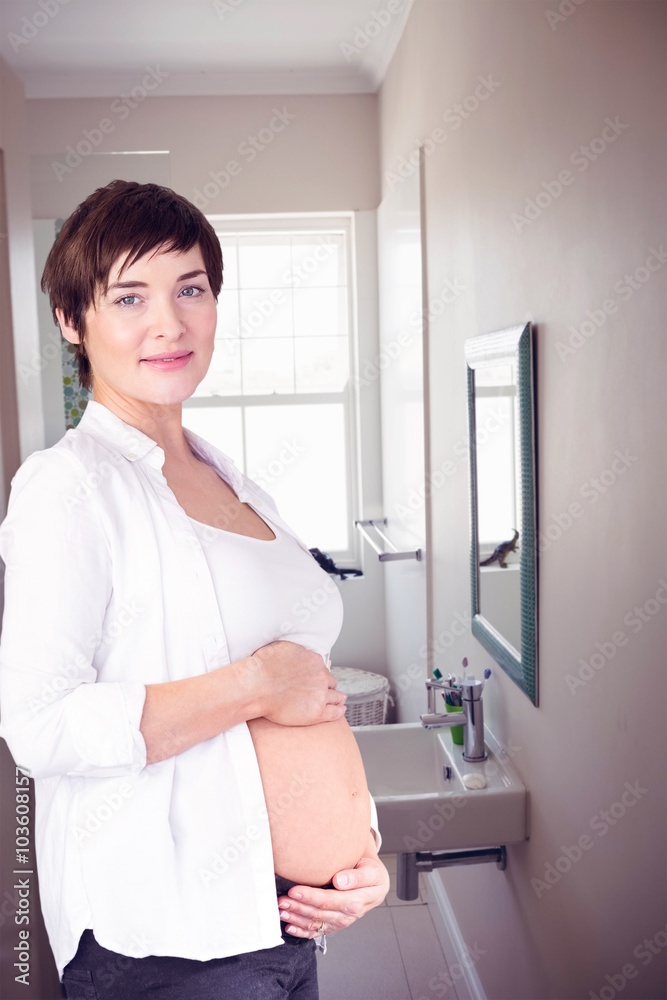 Composite image of portrait of pregnant woman Composite image of portrait of pregnant woman