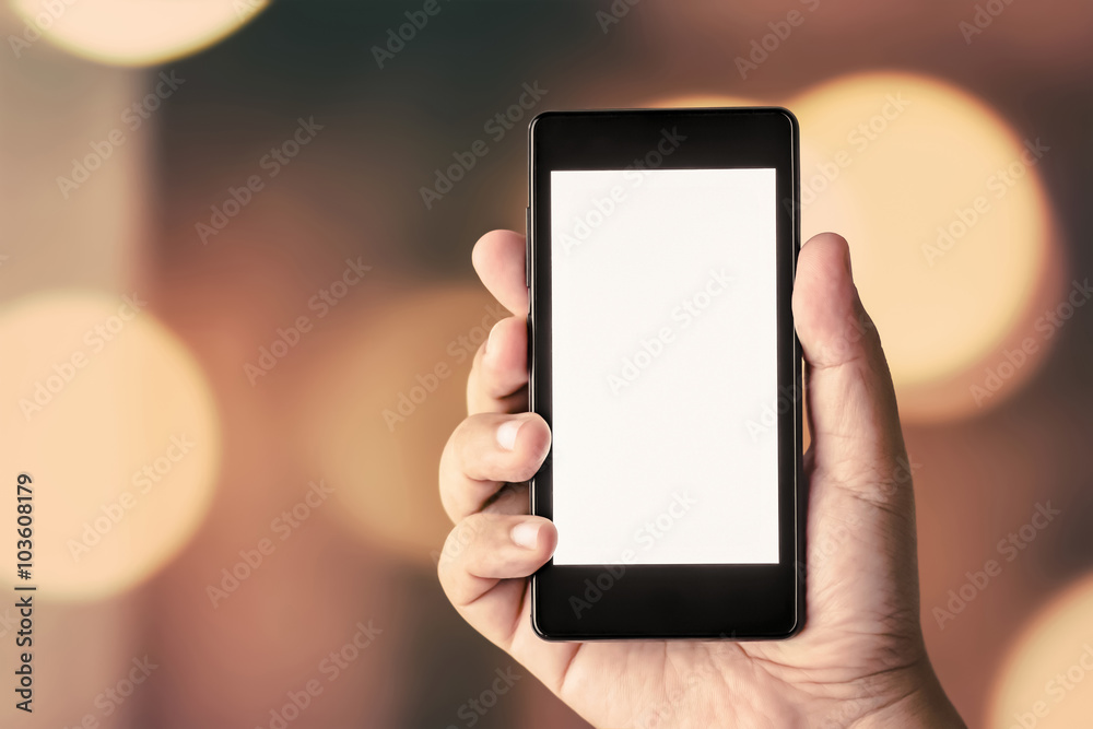 hand holding smart phone hand holding smart phone