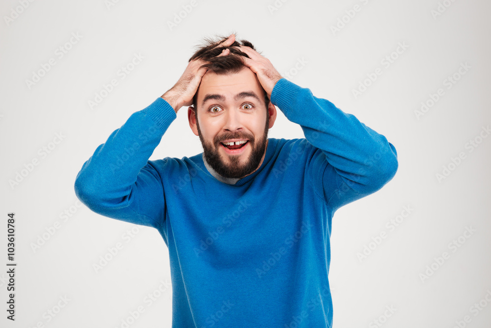 Cheerful amazed man looking at camera Cheerful amazed man looking at camera