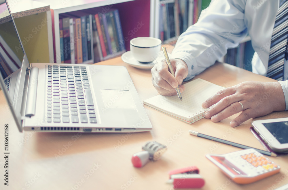 Businessman working on desk Businessman working on desk