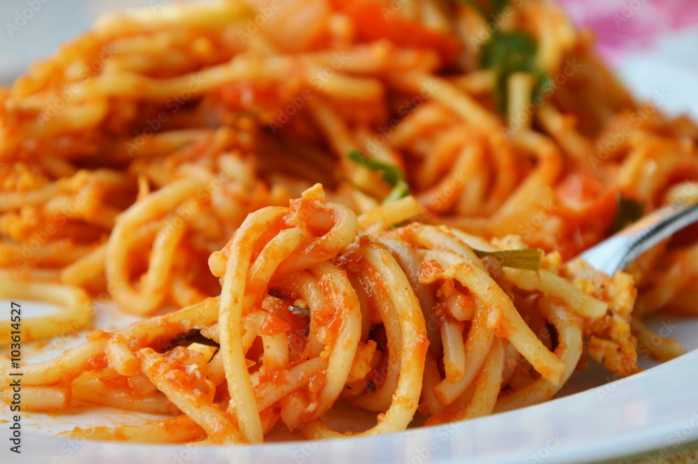 stir-fried spaghetti with egg and ketchup roll over fork stir-fried spaghetti with egg and ketchup roll over fork