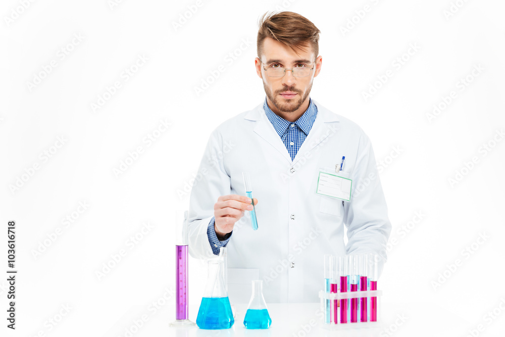 Scientist pouring chemicals Scientist pouring chemicals