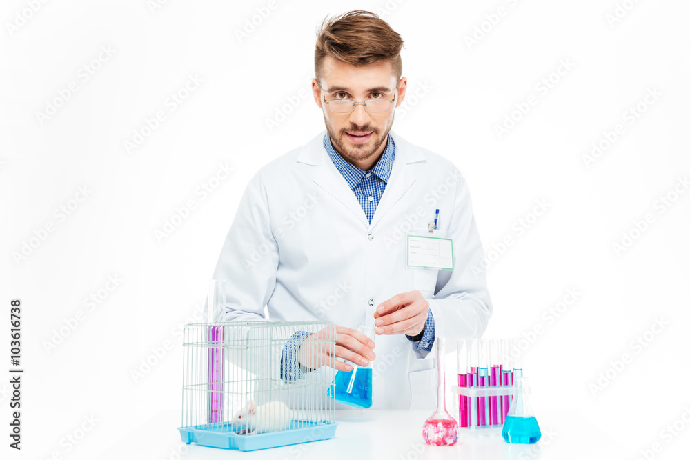 Scientist doing experiments with rat Scientist doing experiments with rat