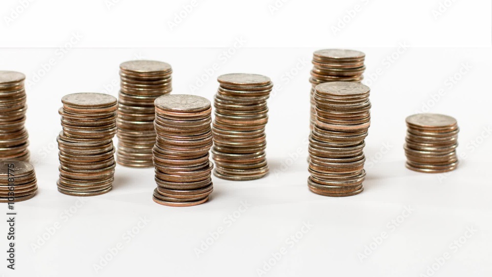 Stacking up profits, coins, money Stacking up profits, coins, money
