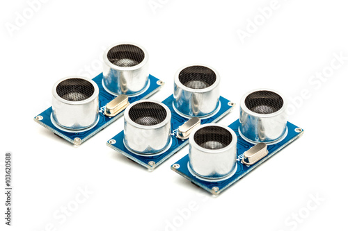 Three ultrasonic range finders isolated on white