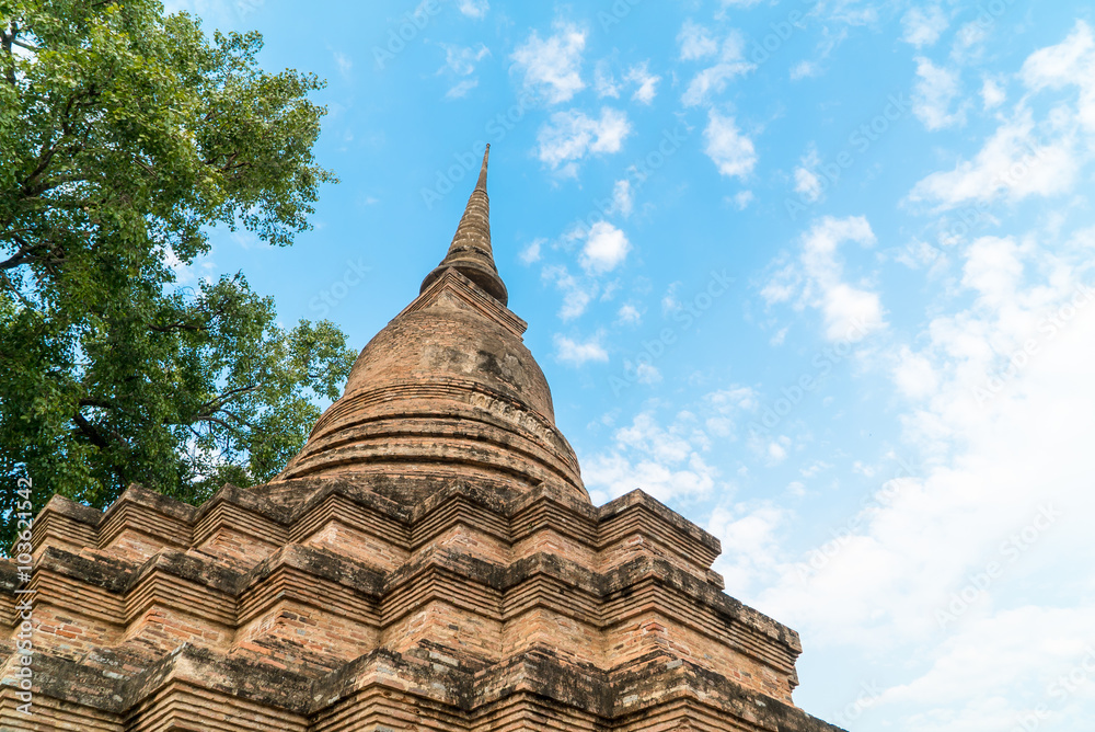Low angle of old pagoda in the temple at Sukhothai Historical Park in Sukhothai Province, Thailand