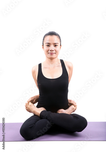 portrait of asian woman wearing black body suit sitting in yoga