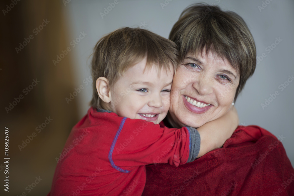 the grandmother embraces grandson
the grandmother embraces grandson