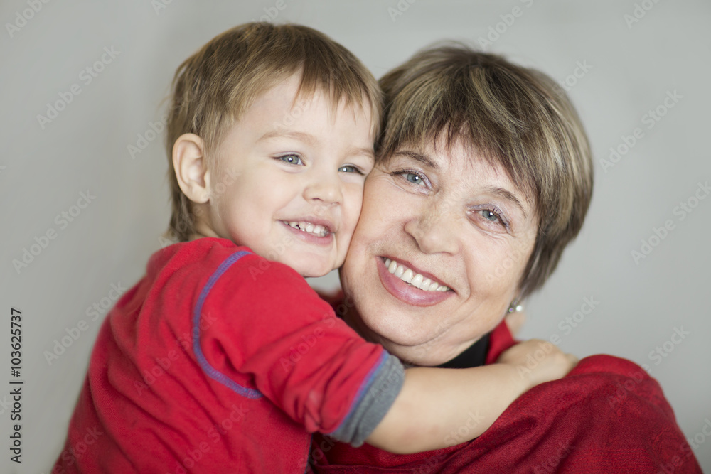 the grandmother embraces grandson
the grandmother embraces grandson