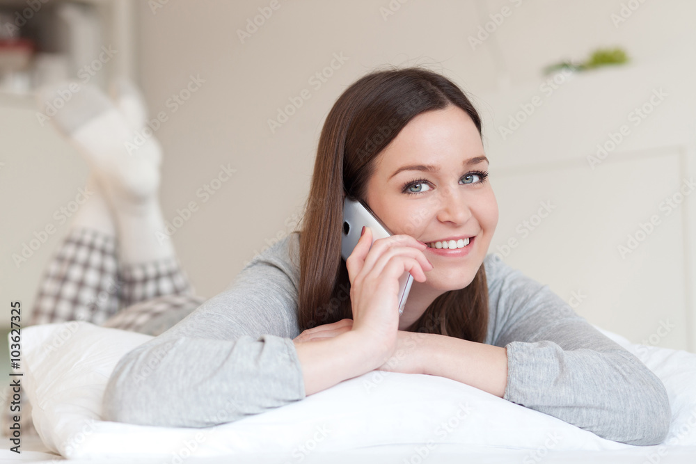 Young woman using cell phone Young woman using cell phone