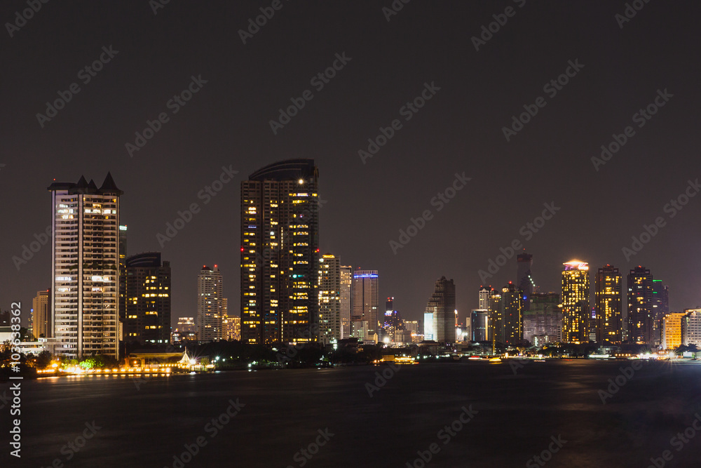 Fototapeta premium Bangkok cityscape river side at Night time,Thailand.