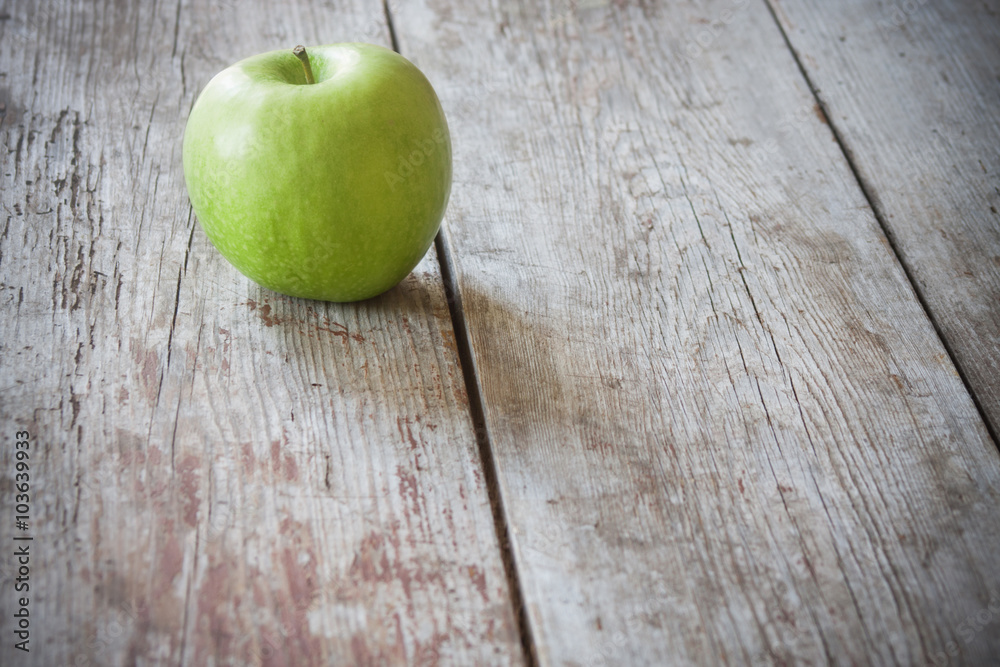 green apple on wooden background green apple on wooden background