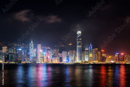 Night view of skyscrapers on waterfront, Hong Kong