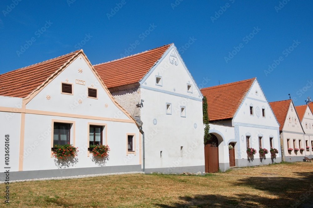 Rural decorated houses in Holasovice, UNESCO World Heritage Site South Bohemia, Czech republic