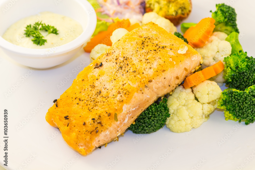 Fried salmon steak with vegetables Fried salmon steak with vegetables