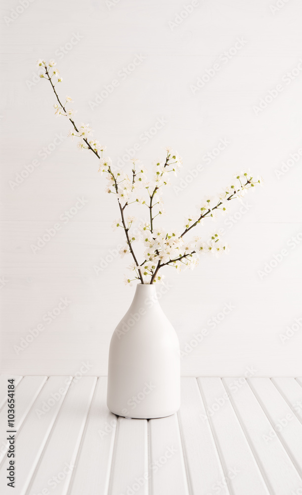 Fototapeta premium Vase with cherry blossom