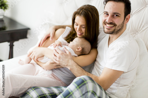 Happy family with newborn baby