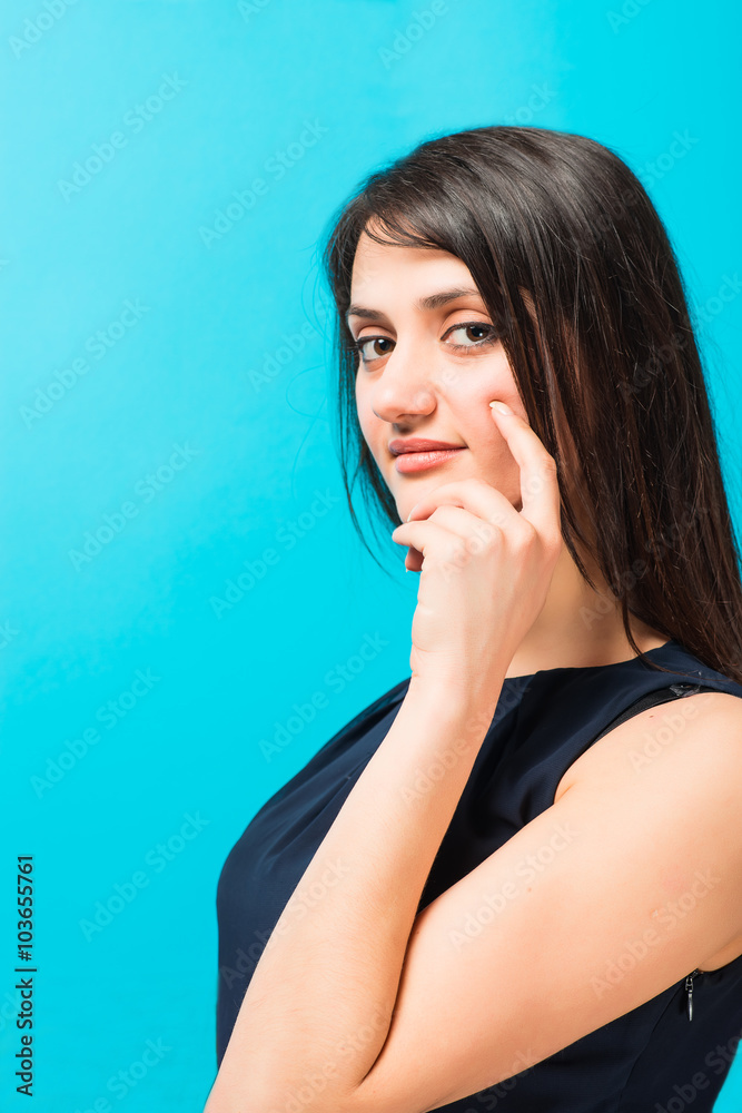 beautiful young woman on a blue background beautiful young woman on a blue background