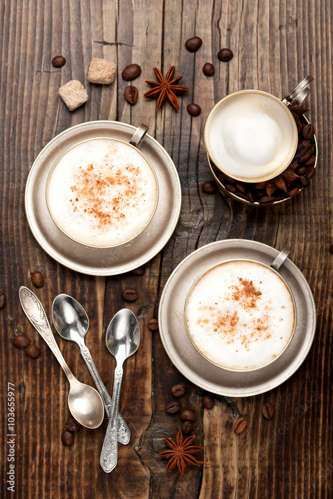 Cappuccino coffee in cups, top view Cappuccino coffee in cups, top view