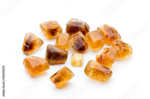 Bilde på lerret Large caramelized sugar on a white background.