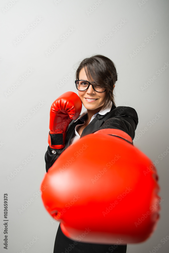 business woman with boxing gloves business woman with boxing gloves