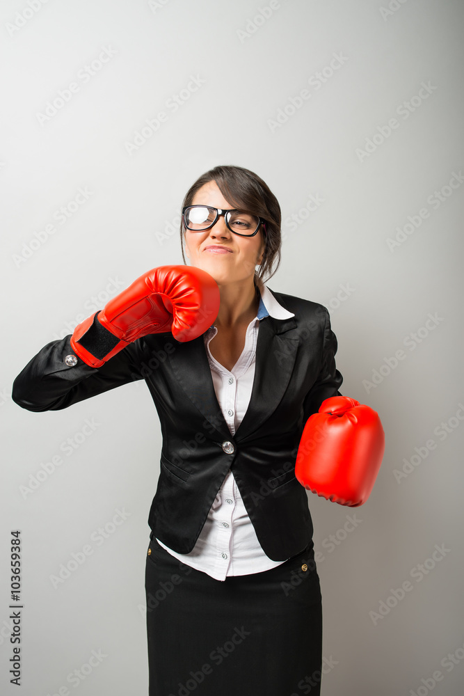 Business women with boxing gloves Business women with boxing gloves