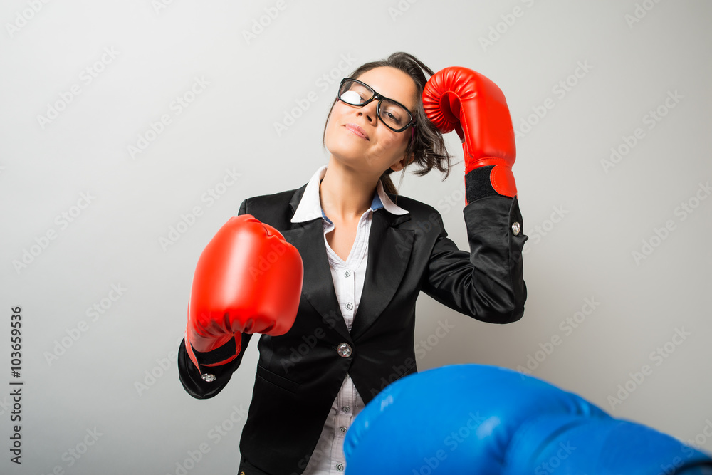 Business women with boxing gloves Business women with boxing gloves