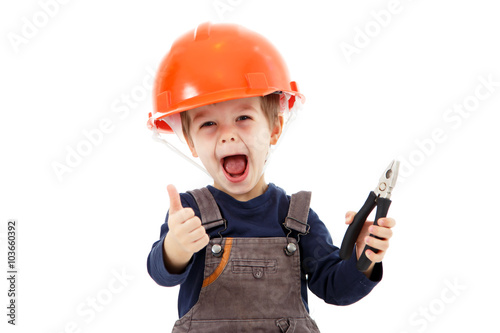 Little happy repairman in hardhat with pliers show thumb up