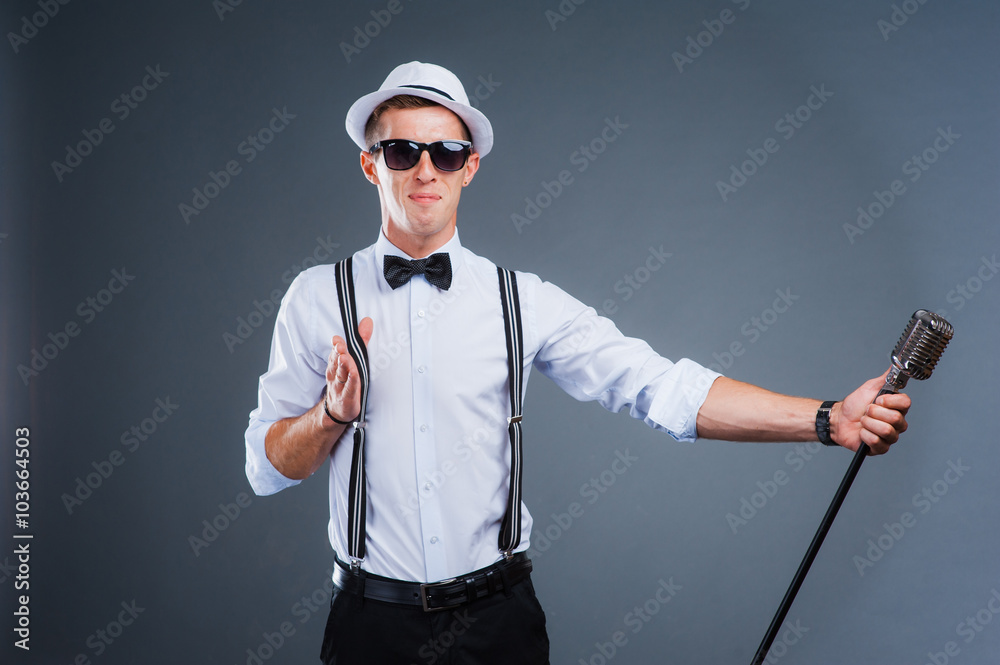 portrait of a man with retro style microphone portrait of a man with retro style microphone