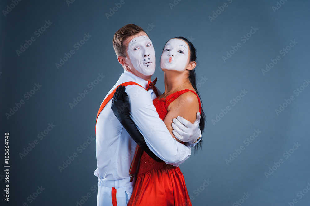 Fototapeta premium two funny mimes isolated on gray background